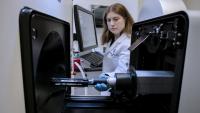 Radiology resident at small animal imaging scanner